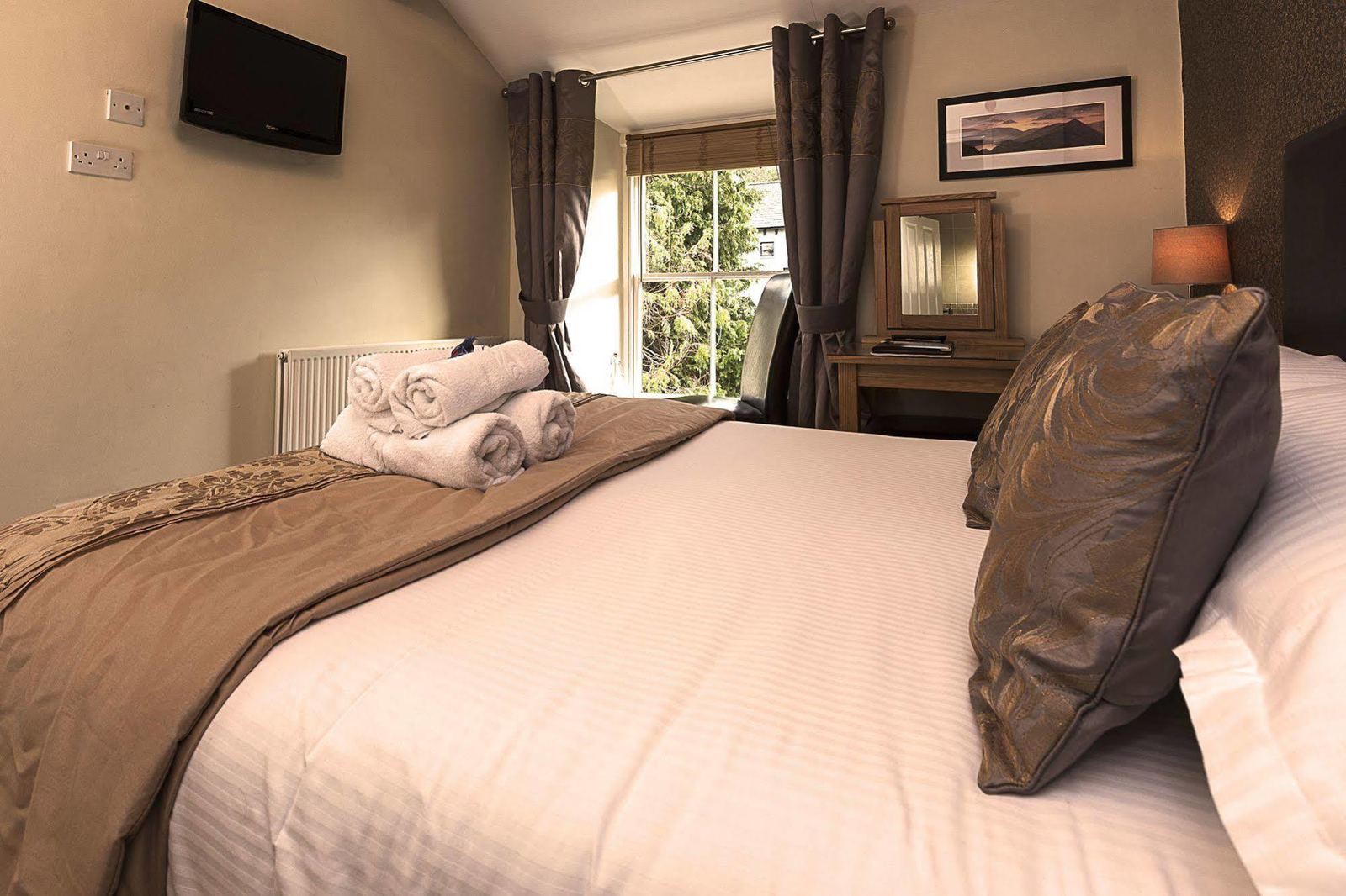 Example guest room with dressing table and bathrobes